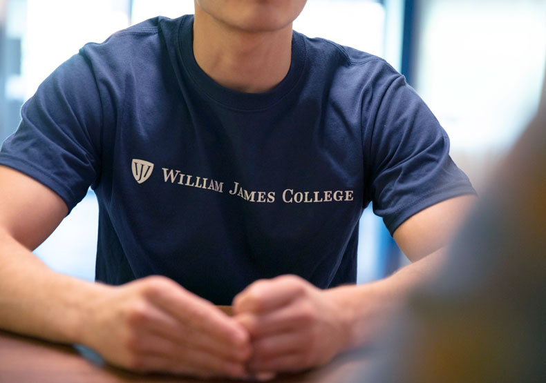 close up of male wearing william james tshirt