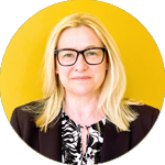 Portrait photo of woman with yellow background smiling, in a circe