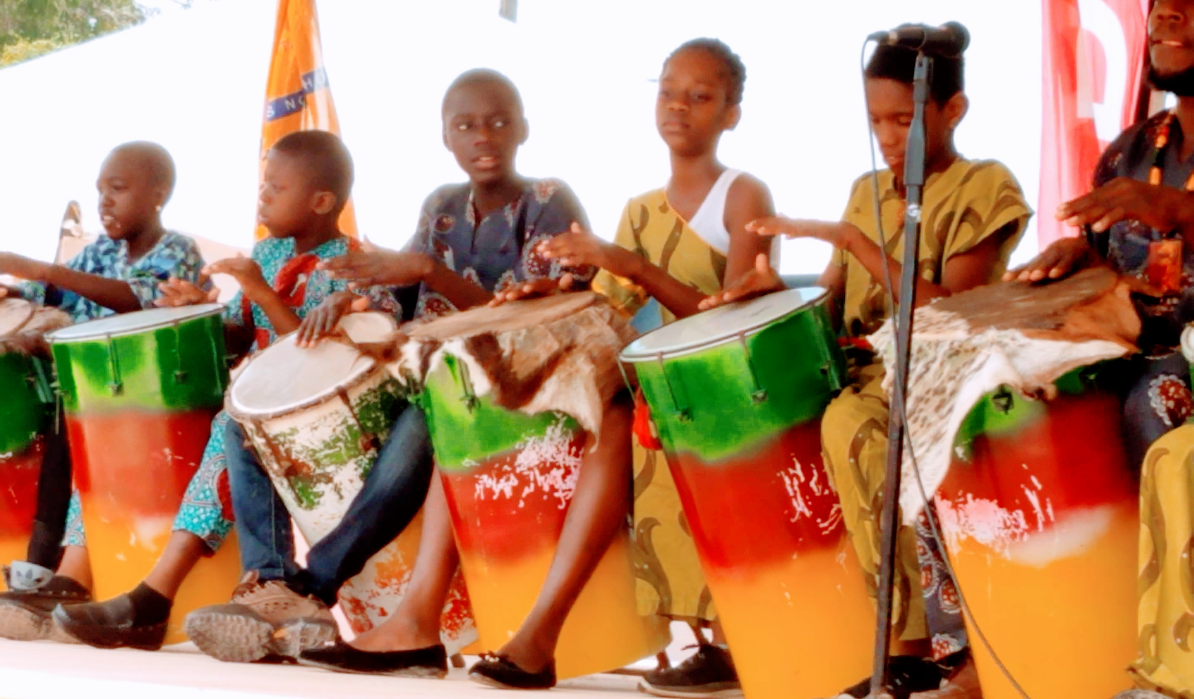 Photo of students in Guyana drumming