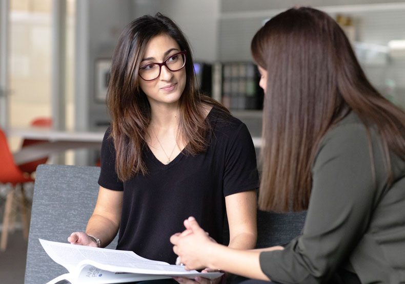 student talking with admissions counselor