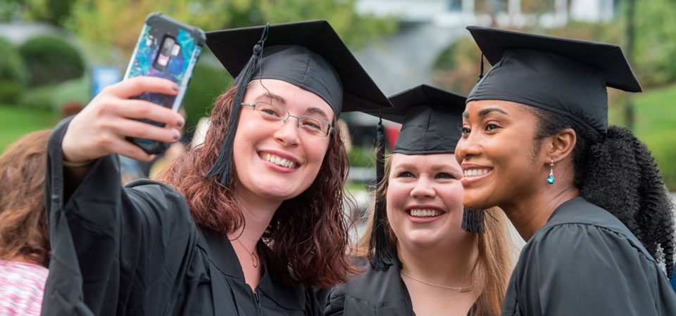 Three WJC Graduates Taking a Selfie