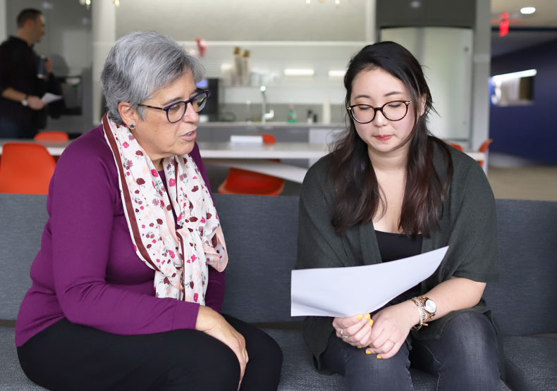 student talking with counselor