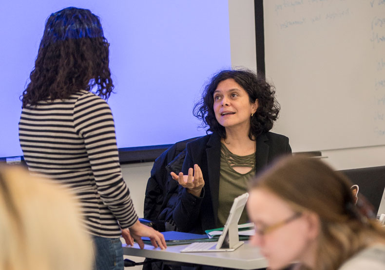 Faculty talking to student