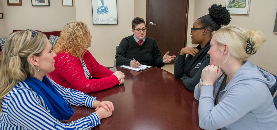 faculty meeting with students