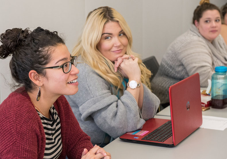 Counseling students in class on campus