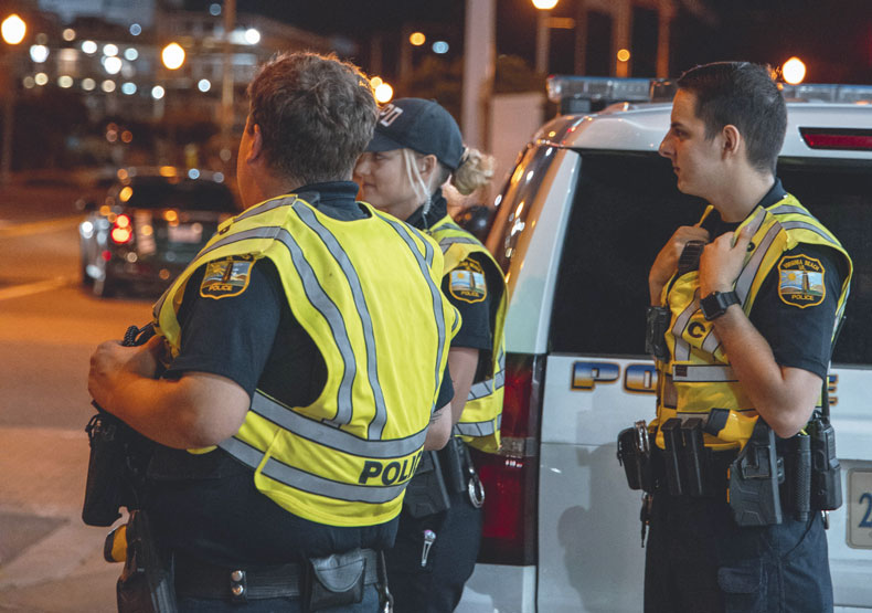 Police officers working at a scene