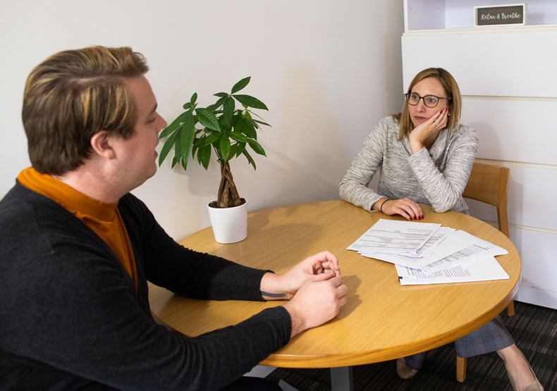 student talking with admissions counselor