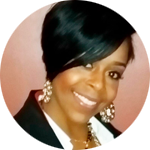 Portrait photo of woman smiling with dark hair