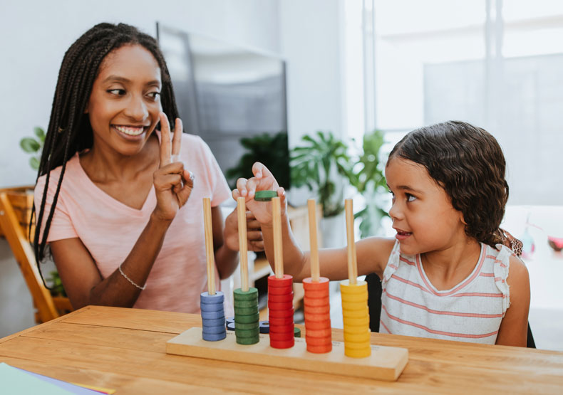 woman working with child