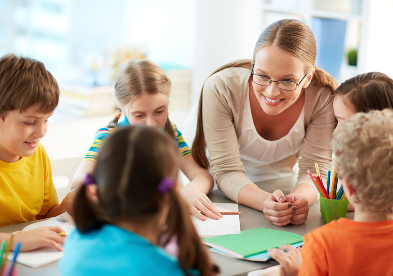 woman with young students