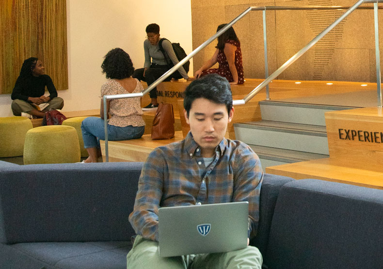 students in campus lounge