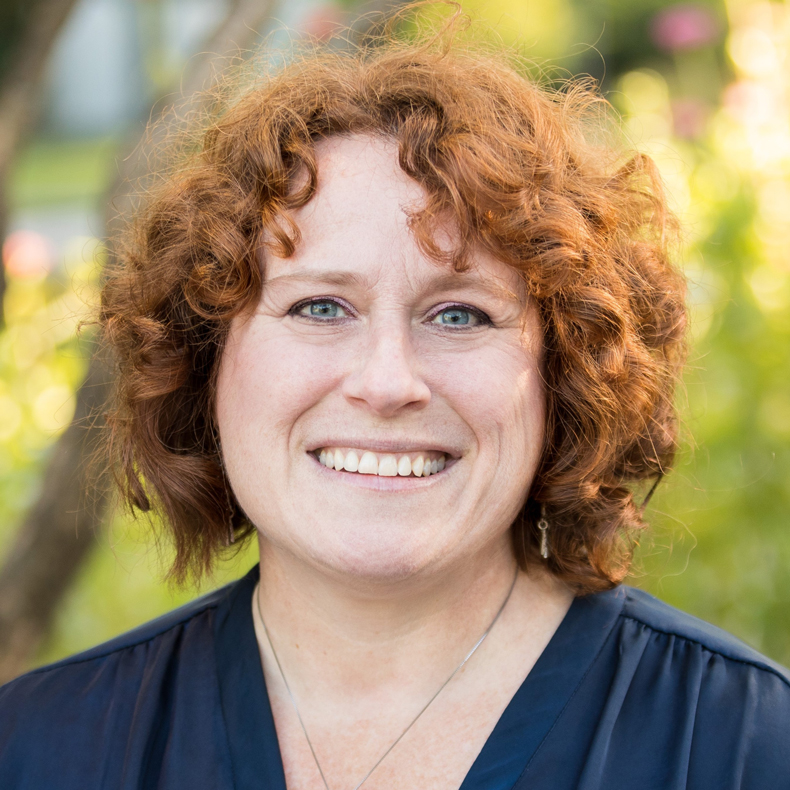 Close up portrait photo of woman smiling