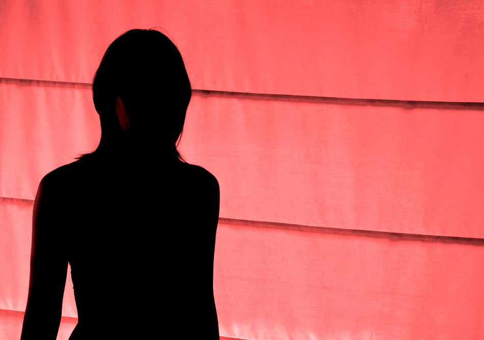 silhouette of a woman on a pink background