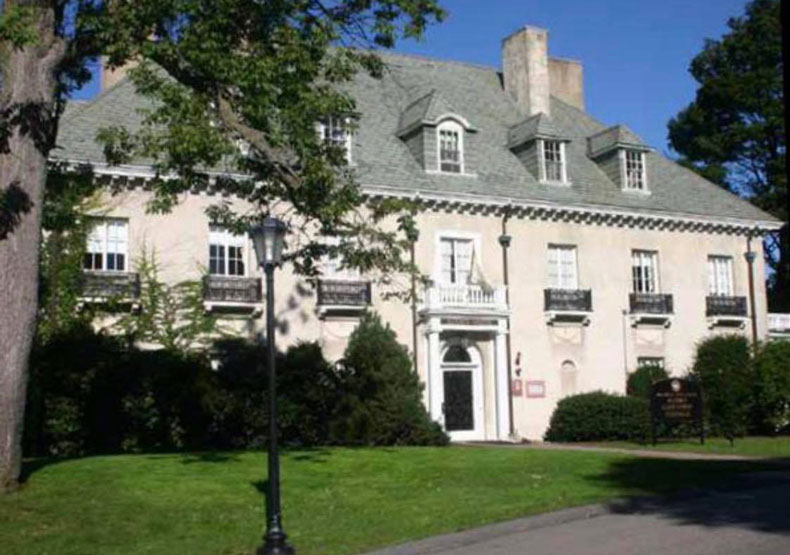 photo of yellow colonial style building