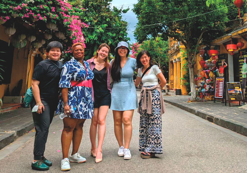 Group of WJC students and faculty in Vietnam street