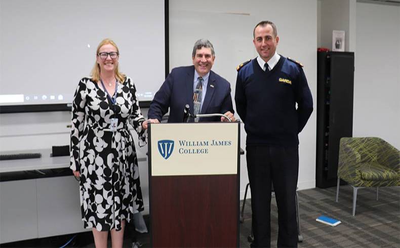 Picture of Dr. Sarah Abbott, Dr. Steve Morreale, chair of the Worcester State Criminal Justice Department (center), and Superintendent Andrew Lacey of An Garda Síochána, the national police and security service of the Republic of Ireland.