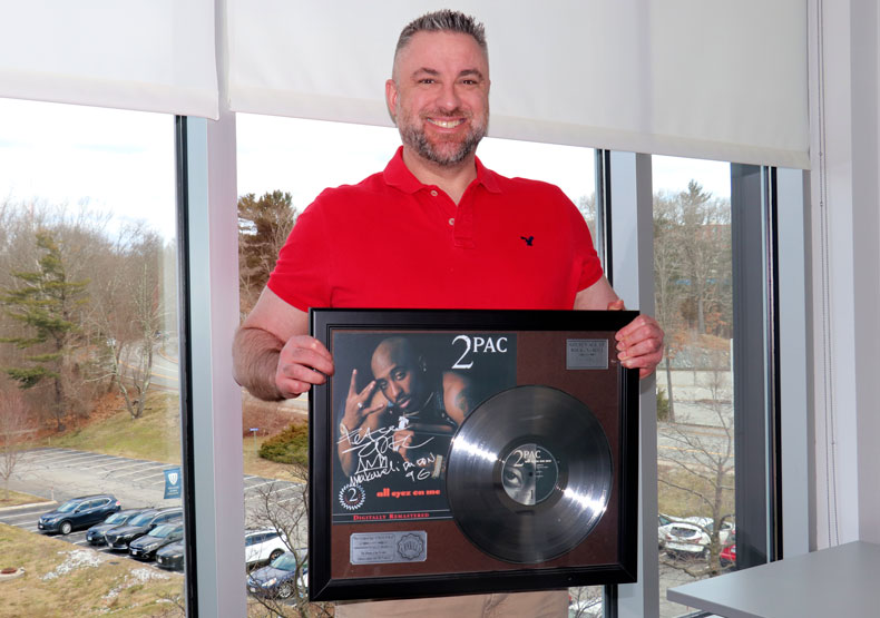 Michael Peters with Tupac Shakur album and picture