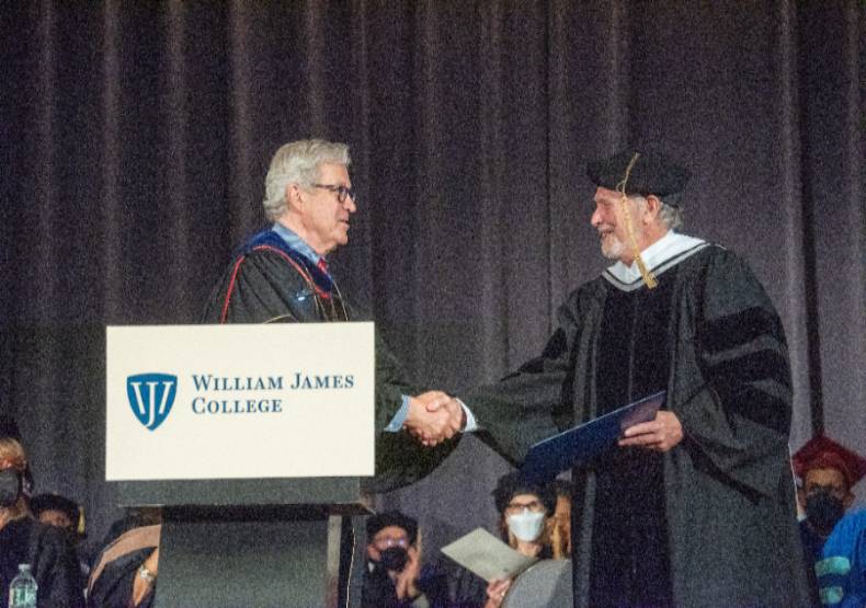 Mike Carroll Accepts Honorary Degree from President Nick Covino