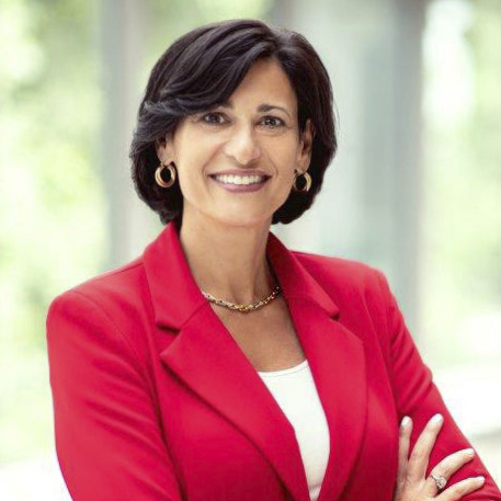 Photo of woman in red jacket smiling