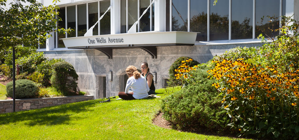 Students on campus front lawn